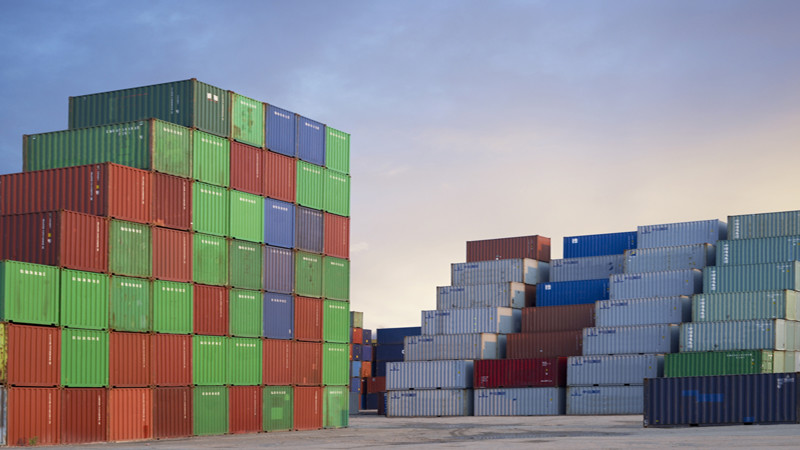 stacked containers in harbor