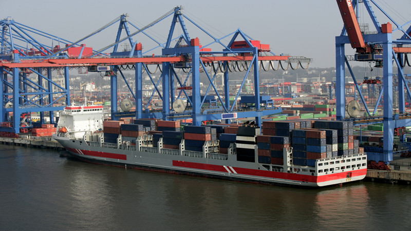 Container ship at container terminal, port of Hamburg, Germany